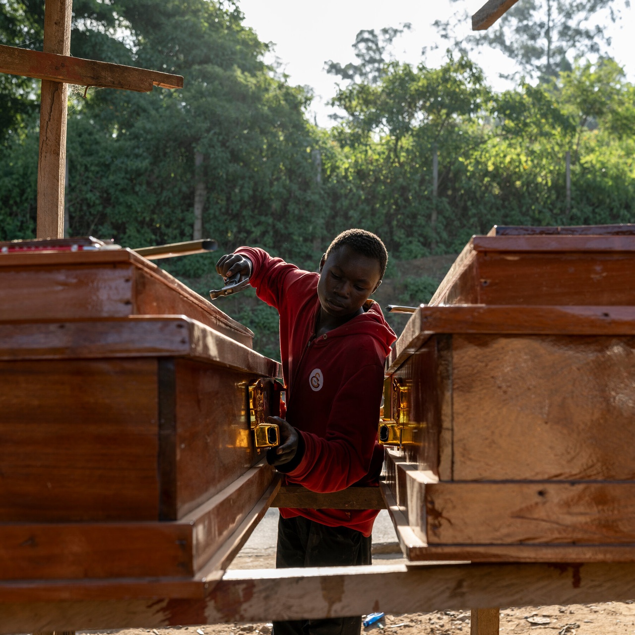 The Ritual of Coffin Making in a City Hit by Ebola